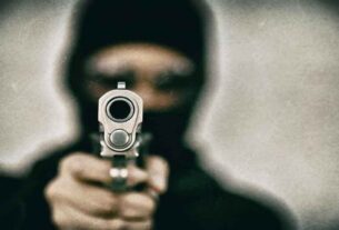 Gangsters Shot Bank Worker